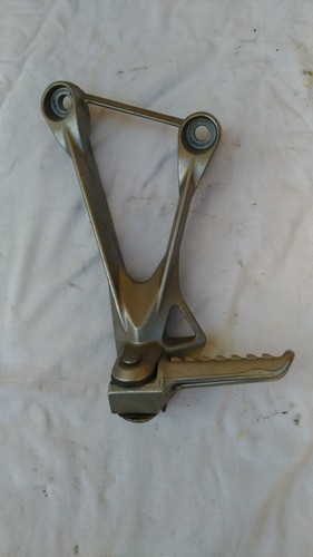 Left passenger footrest - left,